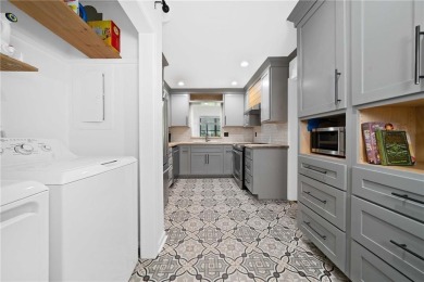 Enjoy resort-style living in the heart of Buckhead in this on Cross Creek Golf Course in Georgia - for sale on GolfHomes.com, golf home, golf lot