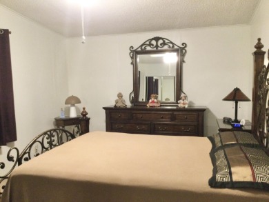 Meticulously maintained home in the much sought after Spanish on Spanish Lakes I in Florida - for sale on GolfHomes.com, golf home, golf lot