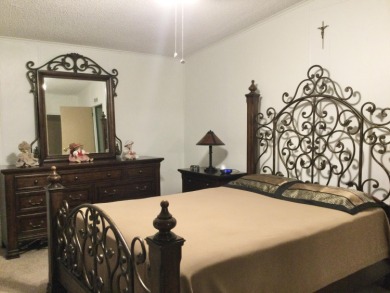 Meticulously maintained home in the much sought after Spanish on Spanish Lakes I in Florida - for sale on GolfHomes.com, golf home, golf lot