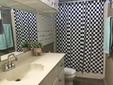 Meticulously maintained home in the much sought after Spanish on Spanish Lakes I in Florida - for sale on GolfHomes.com, golf home, golf lot