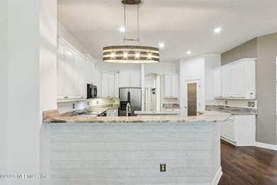 Orange Park Country Club 5-bedroom, 4.5-bath home with an office on Country Club of Orange Park in Florida - for sale on GolfHomes.com, golf home, golf lot