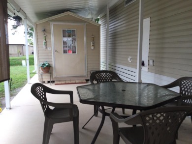 Meticulously maintained home in the much sought after Spanish on Spanish Lakes I in Florida - for sale on GolfHomes.com, golf home, golf lot