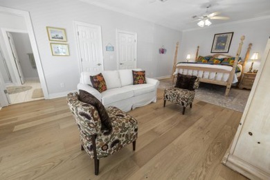 Discover coastal living at its finest in this elegant on Regatta Bay Golf and Country Club in Florida - for sale on GolfHomes.com, golf home, golf lot