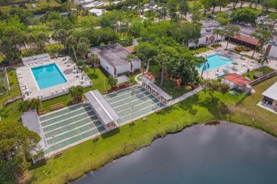 Meticulously maintained home in the much sought after Spanish on Spanish Lakes I in Florida - for sale on GolfHomes.com, golf home, golf lot