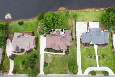 Spectacular Waterfront 4-bedroom, 3.5-bathroom home plus an on Woodside Plantation Country Club in South Carolina - for sale on GolfHomes.com, golf home, golf lot