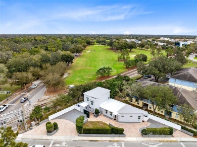 Welcome to this beautifully designed 3-bedroom, 2-bathroom home on Winter Park Country Club in Florida - for sale on GolfHomes.com, golf home, golf lot