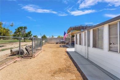 Live on the Green! 
Welcome to 14075 Wimbleton Dr., a on Green Tree Golf Course in California - for sale on GolfHomes.com, golf home, golf lot