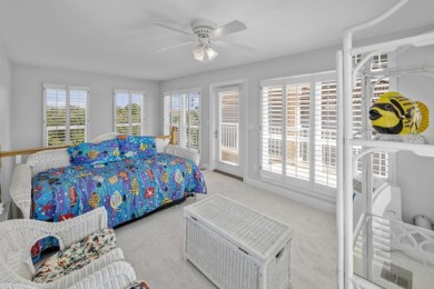 Discover coastal living at its finest in this elegant on Regatta Bay Golf and Country Club in Florida - for sale on GolfHomes.com, golf home, golf lot