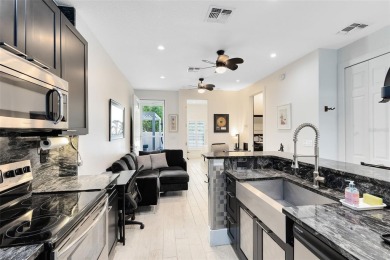 Welcome to this beautifully designed 3-bedroom, 2-bathroom home on Winter Park Country Club in Florida - for sale on GolfHomes.com, golf home, golf lot