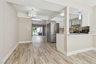 3BR/2.5BA TOWNHOME in the heart of Northdale, zoned to A-RATED on Northdale Golf and Tennis Club in Florida - for sale on GolfHomes.com, golf home, golf lot