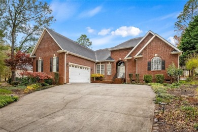 Quality craftsmanship in this one level brick home perfectly on Cobbs Glen Country Club in South Carolina - for sale on GolfHomes.com, golf home, golf lot