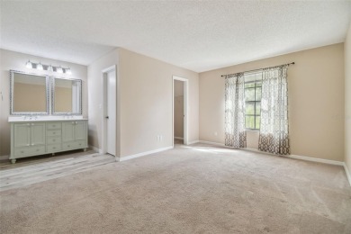 3BR/2.5BA TOWNHOME in the heart of Northdale, zoned to A-RATED on Northdale Golf and Tennis Club in Florida - for sale on GolfHomes.com, golf home, golf lot