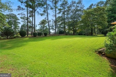 Enjoy country club living in this beautifully updated 3-bedroom on Fairfield Plantation Golf and Country Club in Georgia - for sale on GolfHomes.com, golf home, golf lot