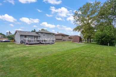 Step into this charming tri-level home in the Lakes of the Four on Lakes of the Four Seasons Country Club in Indiana - for sale on GolfHomes.com, golf home, golf lot