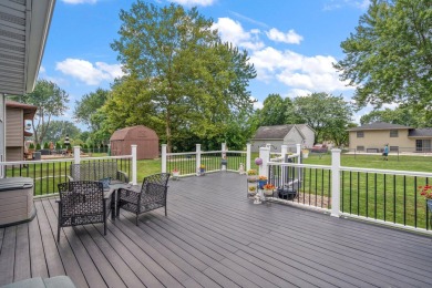 Step into this charming tri-level home in the Lakes of the Four on Lakes of the Four Seasons Country Club in Indiana - for sale on GolfHomes.com, golf home, golf lot