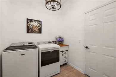 ENJOY SPECTACULAR, PANORAMIC, WATERFRONT VIEWS in this 3/2 on El Diablo Executive Golf Course in Florida - for sale on GolfHomes.com, golf home, golf lot
