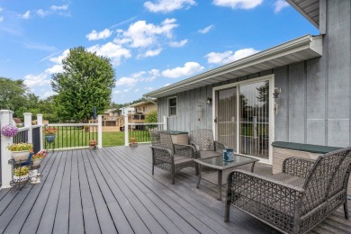 Step into this charming tri-level home in the Lakes of the Four on Lakes of the Four Seasons Country Club in Indiana - for sale on GolfHomes.com, golf home, golf lot