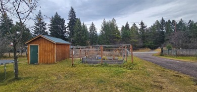 2 Homes on 1 Acre in Columbia Falls.  The Main house is vacant on Meadow Lake Golf Resort in Montana - for sale on GolfHomes.com, golf home, golf lot