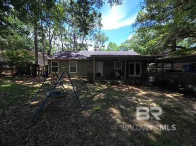 Charming 3-bedroom, 2-bath home with 1,430 sq ft located in the on Lake Forest Yacht and Country Club in Alabama - for sale on GolfHomes.com, golf home, golf lot