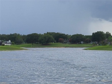 ENJOY SPECTACULAR, PANORAMIC, WATERFRONT VIEWS in this 3/2 on El Diablo Executive Golf Course in Florida - for sale on GolfHomes.com, golf home, golf lot