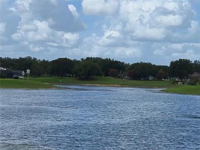 ENJOY SPECTACULAR, PANORAMIC, WATERFRONT VIEWS in this 3/2 on El Diablo Executive Golf Course in Florida - for sale on GolfHomes.com, golf home, golf lot