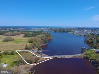 Incredible panoramic views from this oversized waterfront lot on Bayside Resort Golf Club in Delaware - for sale on GolfHomes.com, golf home, golf lot