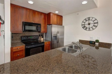 This exquisite top-floor residence in Highland Greens Lodge on Breckenridge Golf Club in Colorado - for sale on GolfHomes.com, golf home, golf lot