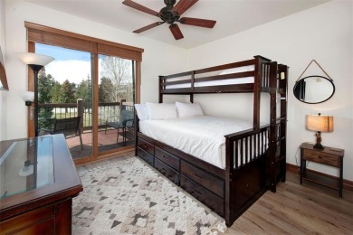This exquisite top-floor residence in Highland Greens Lodge on Breckenridge Golf Club in Colorado - for sale on GolfHomes.com, golf home, golf lot