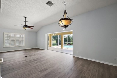 STUNNINGLY UPDATED, GOLF FRONT, 3/2 BLOCK and STUCCO Magnolia on The Links of Spruce Creek in Florida - for sale on GolfHomes.com, golf home, golf lot