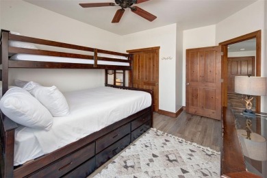 This exquisite top-floor residence in Highland Greens Lodge on Breckenridge Golf Club in Colorado - for sale on GolfHomes.com, golf home, golf lot