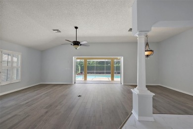 STUNNINGLY UPDATED, GOLF FRONT, 3/2 BLOCK and STUCCO Magnolia on The Links of Spruce Creek in Florida - for sale on GolfHomes.com, golf home, golf lot
