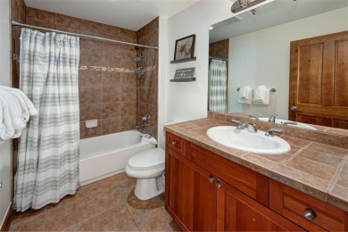 This exquisite top-floor residence in Highland Greens Lodge on Breckenridge Golf Club in Colorado - for sale on GolfHomes.com, golf home, golf lot