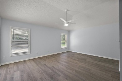 STUNNINGLY UPDATED, GOLF FRONT, 3/2 BLOCK and STUCCO Magnolia on The Links of Spruce Creek in Florida - for sale on GolfHomes.com, golf home, golf lot