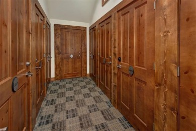 This exquisite top-floor residence in Highland Greens Lodge on Breckenridge Golf Club in Colorado - for sale on GolfHomes.com, golf home, golf lot