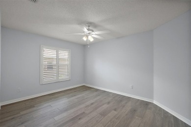 STUNNINGLY UPDATED, GOLF FRONT, 3/2 BLOCK and STUCCO Magnolia on The Links of Spruce Creek in Florida - for sale on GolfHomes.com, golf home, golf lot
