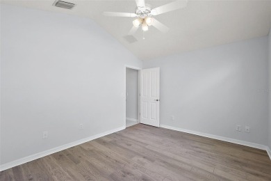 STUNNINGLY UPDATED, GOLF FRONT, 3/2 BLOCK and STUCCO Magnolia on The Links of Spruce Creek in Florida - for sale on GolfHomes.com, golf home, golf lot