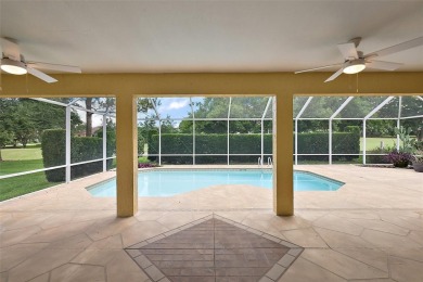 STUNNINGLY UPDATED, GOLF FRONT, 3/2 BLOCK and STUCCO Magnolia on The Links of Spruce Creek in Florida - for sale on GolfHomes.com, golf home, golf lot
