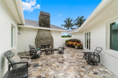 Prestigious Sailfish Point residence, spanning 7,600 sf, was on Sailfish Point Golf Club, Inc. in Florida - for sale on GolfHomes.com, golf home, golf lot