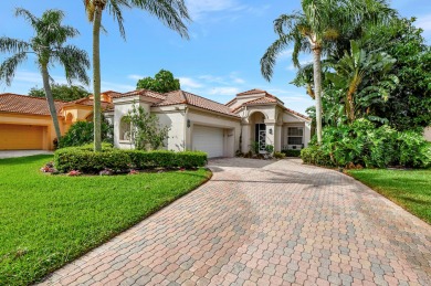 Absolutely stunning home on a serene lot with beautiful garden on Indian Spring Golf and Country Club in Florida - for sale on GolfHomes.com, golf home, golf lot