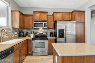 ARIZONA LIVING MADE EASY!! This charming home comes fully on Poston Butte Golf Club in Arizona - for sale on GolfHomes.com, golf home, golf lot