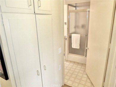 Charming and expanded one-bedroom, one-bathroom cottage nestled on Leisure World Seal Beach Golf Course in California - for sale on GolfHomes.com, golf home, golf lot