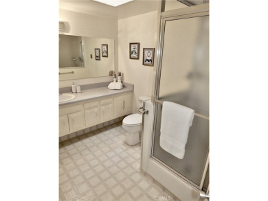 Charming and expanded one-bedroom, one-bathroom cottage nestled on Leisure World Seal Beach Golf Course in California - for sale on GolfHomes.com, golf home, golf lot