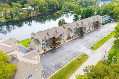 Penthouse Waterfront 2 Bedroom 2 Bath with gorgeous up- close on Pointe Royale Village Country Club in Missouri - for sale on GolfHomes.com, golf home, golf lot