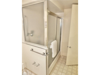 Charming and expanded one-bedroom, one-bathroom cottage nestled on Leisure World Seal Beach Golf Course in California - for sale on GolfHomes.com, golf home, golf lot