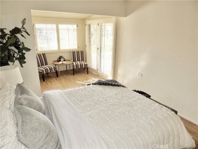 Charming and expanded one-bedroom, one-bathroom cottage nestled on Leisure World Seal Beach Golf Course in California - for sale on GolfHomes.com, golf home, golf lot