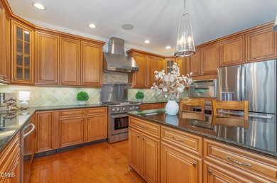 LOCATION! LOCATION! LOCATION! This exceptional luxury residence on Brier Creek Country Club in North Carolina - for sale on GolfHomes.com, golf home, golf lot