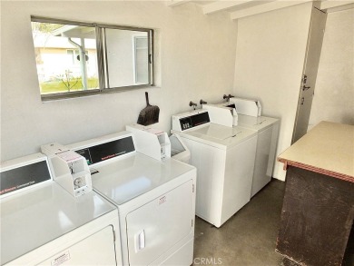 Charming and expanded one-bedroom, one-bathroom cottage nestled on Leisure World Seal Beach Golf Course in California - for sale on GolfHomes.com, golf home, golf lot