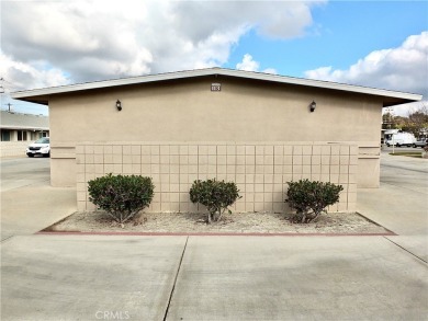 Charming and expanded one-bedroom, one-bathroom cottage nestled on Leisure World Seal Beach Golf Course in California - for sale on GolfHomes.com, golf home, golf lot