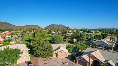 Immaculate, upgraded and perfectly positioned in Monarch Point on The Legend at Arrowhead in Arizona - for sale on GolfHomes.com, golf home, golf lot