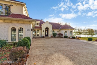 A grand Mediterranean in one of the most coveted locations at on Lake Tansi Village Country Club in Tennessee - for sale on GolfHomes.com, golf home, golf lot